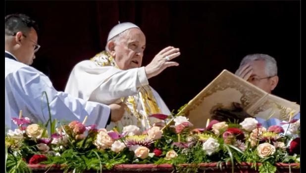Pope Francis bestows the plenary 'Urbi et Orbi' (to the city and to the world) blessing from the central lodge of the St. Peter's Basilica at The Vatican at the end of the Easter Sunday mass, Sunday, April 9, 2023. (AP Photo/Alessandra Tarantino) Pope Francis bestows the plenary 'Urbi et Orbi' (