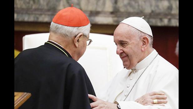 Pope Francis exchanges greetings with Cardinal Angelo Sodano, left, on the occasion of the pontiff's Christmas greetings to the Roman Curia, in the Clementine Hall at the Vatican, Saturday, Dec. 21, 2019. (AP Photo/Andrew Medichini, Pool) Pope Francis exchanges greetings with Cardinal Angelo Sodano, left