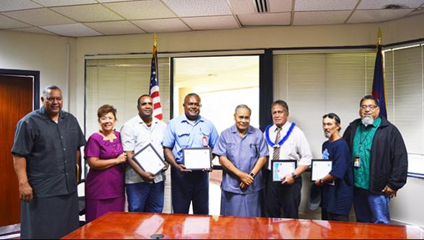  [l-r] Lt. Gov. Lemanu Palepoi Sialega Mauga, Port Administration director Taimalelagi Dr. Claire Poumele, Port employee Sunia Davetawalu, Port employees Timoci Loloma, Gov. Lolo Matalasi Moliga, Harbor Master Silila Patane, Port employee Joseph Fa’agata, and Port Administration deputy director Chris King, yesterday morning at the Governor’s Office Conference room at the conclusion of a brief recognition ceremony. (See story inside for details of the quick actions of the 3 Port employees that saved Patane’s