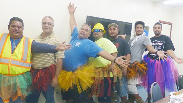 Male Port Admin employees decked out in Halloween "tutus"
