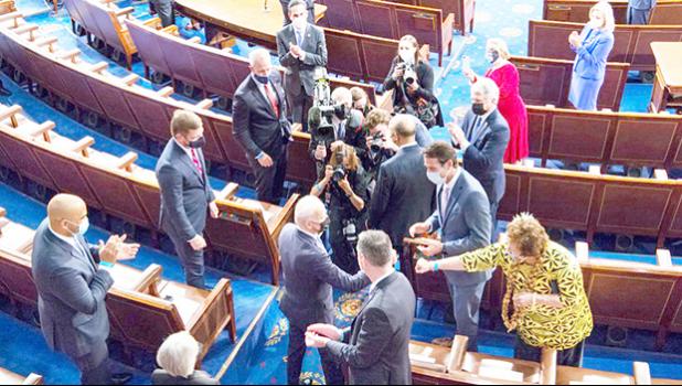 President Biden and Congresswoman Amata fist-bump