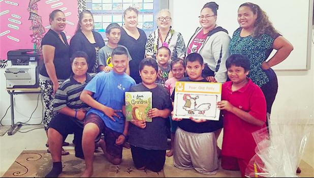 People participating in Lupelele Elementary’s Read Aloud program