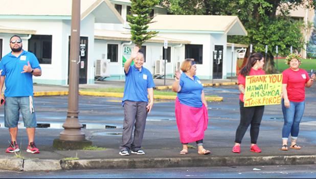 Repatriation passengers at thank you wave