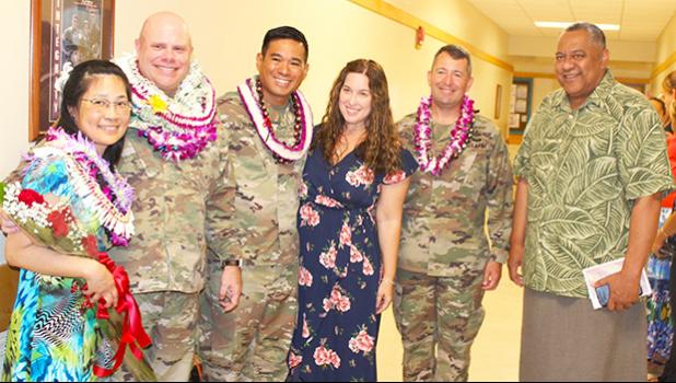 [l-r] Wendy and her husband, Lt. Col. Clinton Seybold; Lt. Col. Alejandro L. Buniag Jr., and his wife, Amanda; Col. Travis C. Delk, Commander of the US Army Reserve Theater Support Group-Pacific; and Lt. Gov. Lemanu Palepoi Sialega Mauga
