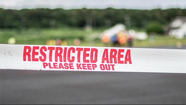 Police tape sealing off the area at the Mulifanua wharf,