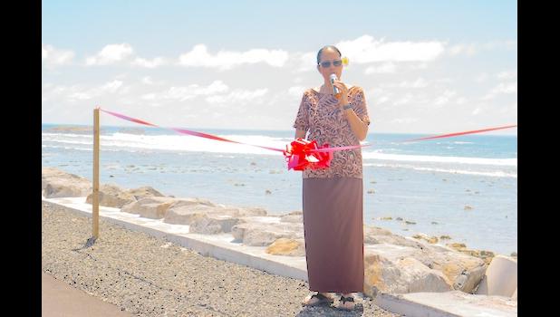 The dedication ceremony ended with Director of Public Works Faleosina Voigt cutting the ribbon to officially open the Matatula New Access Road and Slope Stabilization projects. Director of Public Works Faleosina Voigt