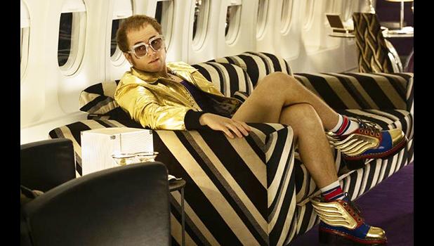 Taron Egerton portraying Elton John