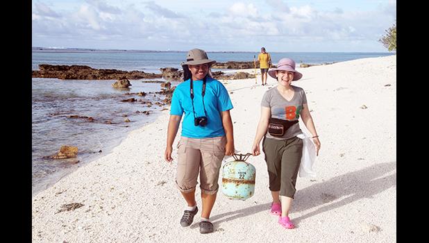 Former ASCC student Aveipepa Fua (left) escorts Laura Fong of the PBS New Hour 