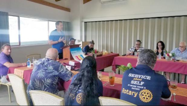 Dr Jean Letarte (seated left) and Chris Fisher (speaking),