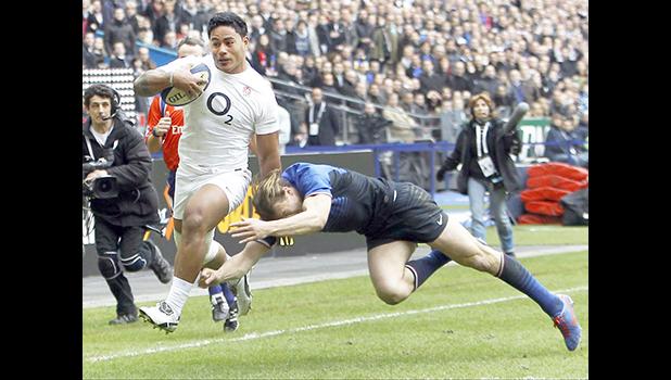 This is a Sunday, March 11, 2012 file photo of England's Manu Tuilagi, left, as he runs to score a try despite the tackle of France's Aurelien Rougerie during their six nations rugby union match at the Stade de France stadium, in Saint Denis, outside Paris, Sunday. England's Rugby Football Union said Monday Aug. 7, 2017 that Manu Tuilagi and Denny Solomona have been sent home from a national team training camp. An RFU statement says the disciplinary action is a result of "culture issues" with no further explanation provided. (AP Photo/Christophe Ena/File) This is a Sunday, March 11, 2012 file photo of England's Manu Tuilagi, left, as he runs to score a try despite the tackle of France's Aurelien Rougerie during their six nations rugby union match at the Stade de France stadium, in Saint Denis, outside Paris, Sunday. England's Rugby Football Union said Monday Aug. 7, 2017 that Manu Tuilagi and Denny Solomona have been sent home from a national team training camp. An RFU statement says the disciplinary action is a result of "culture issues" with no further exp