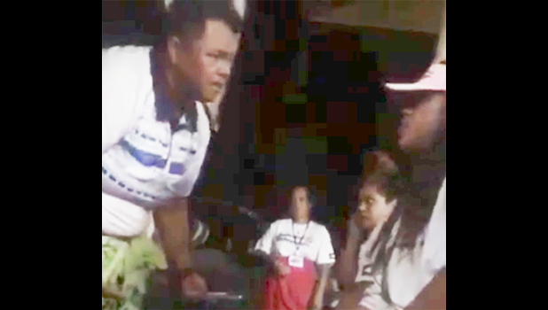 This photo is a screenshot from the video, showing head coach Annie Coffin - who is also a DPS police officer - addressing one of her players, only seconds before she allegedly put her hands on her.
