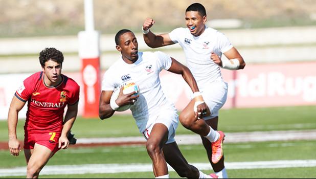 USA's Faitala Talapusi celebrates Perry Baker's line break 