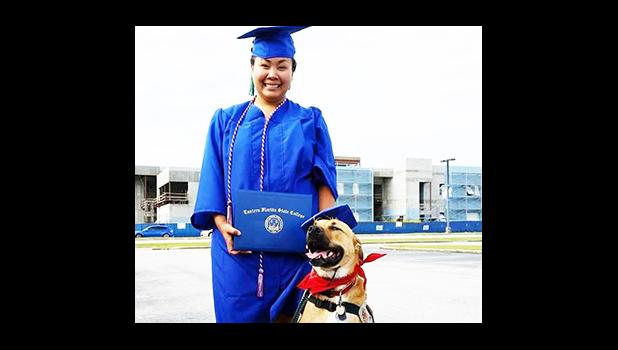 Miss Jee Hae Choe of Faleniu with her service dog DannyBoy since 2013. DannyBoy helped her come out of severe depression and inspired her to open a business helping and training dogs. She is seen here after graduating from Eastern Florida State College, with DannyBoy. Her business will open this weekend, in Florida — for more information visit www.samoandogtrainer.com.  [Courtesy photo]