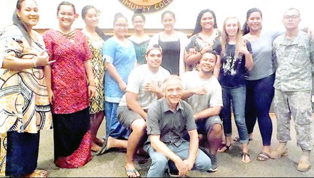 ASCC Science Department chairman Dr. Randel DeWees (front, center) with some of the students who participated in last week's Science Symposium at the College.  [Photo: J. Kneubuhl]