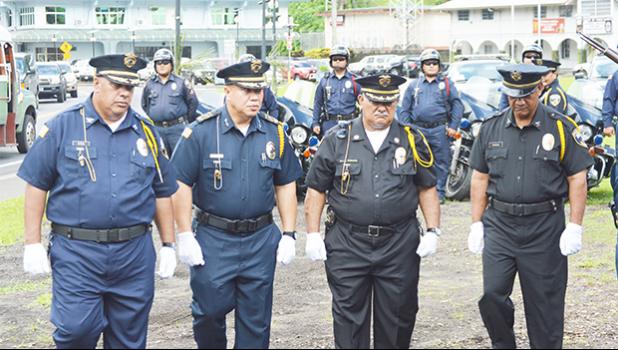 Seniors police officers parading during Police Week celebration earlier this year at Malaeoletalu in Fagatogo. DPS has a new established unit - the Training Division - which is set up to provide training for local police officers. See story for full details.  [photo: AF]