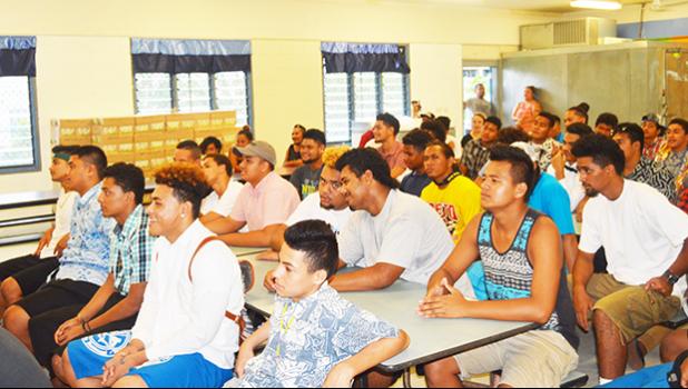 Members of the Samoana High School football team during a gathering at the school cafeteria last week Friday where members of the Booster Club presented the new uniform to the football team. [photo AF]