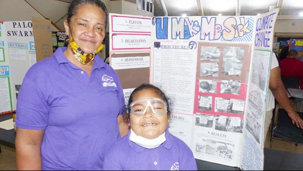 Semo Afalava with his science fair project