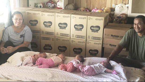 Mrs. Filomena Sokimi (far left) and Sokimi Sokimi Jr. (far right) of Ili’ili with the four baby girls