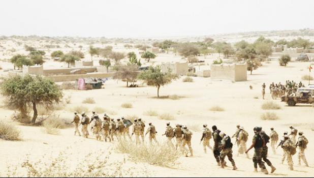 In this March 7, 2015, file photo, Chadian troops and Nigerian special forces participate in the Flintlock exercises with the U.S. military and its Western partners in Mao, Chad. The Pentagon told The Associated Press on Oct. 27, 2017, that there is no truth to claims in a viral story that Sgt. La David Johnson betrayed his fellow soldiers in an ambush that killed him and three of his comrades in Niger earlier this month. (AP Photo/Jerome Delay, File) In this March 7, 2015, file photo, Chadian troops and Nigerian special forces participate in the Flintlock exercises with the U.S. military and its Western partners in Mao, Chad. The Pentagon told The Associated Press on Oct. 27, 2017, that there is no truth to claims in a viral story that Sgt. La David Johnson betrayed his fellow soldiers in an ambush that killed him and three of his comrades in Niger earlier this month. (AP Photo/Jerome Delay, File)