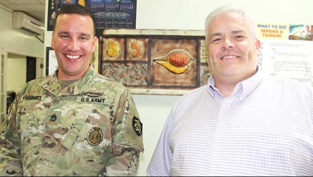 Neil Woolf (right) with Sgt. First Class Nick Marshall