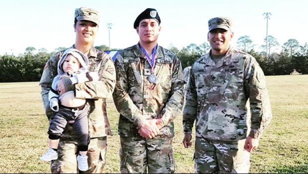 SPC Arrianna Princess Auva'a of Malaeloa with Mr. Kyren Thomsen, SPC Soapy J. Ifopo of Tafuna, and SSG Joey Taiese of Aunu'u