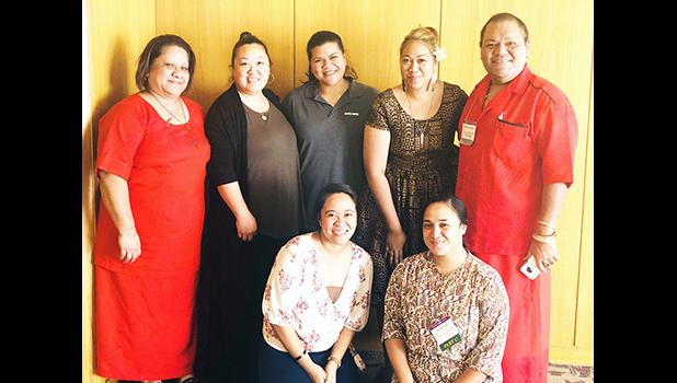 (l-r standing) SPED director Teresa Atuatasi; Part C Program manager Lisa Maga; Part C Program coordinator Roseanne Felise; Part C service coordinator Maelynn Aiono; SPED representative Junella Boat. (l-r kneeling) Part C service coordinator Arlene Taumua, and Part C SSIP coordinator Gloria.