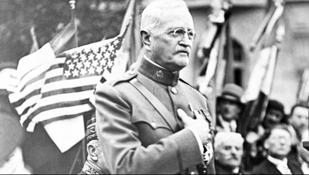 In this Sept. 15, 1935, file photo, General John J. Pershing makes a speech during the ceremony of planting an oak tree named after him to celebrate his 75th birthday and the 17th anniversary of the battle of St Mihiel, in St Mihiel, France. In the aftermath of World War I, 14 countries competed in the Inter-Allied Games in 1919, in a stadium named for Pershing, commander of the American Expeditionary Force in Europe. (AP Photo/File) General John J. Pershing