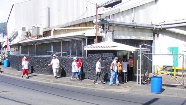 StarKist workers enter the canning plant in Pago Pago, American Samoa.
