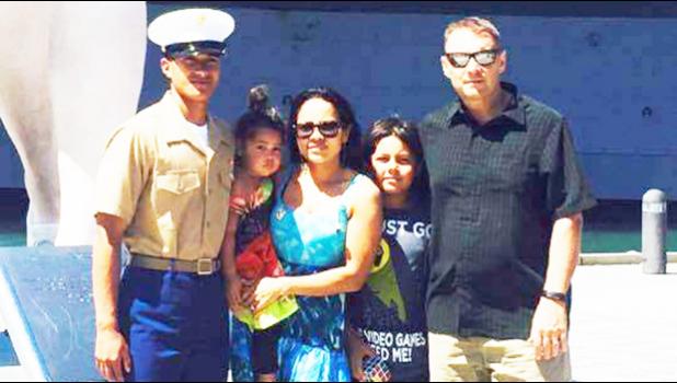 LCPL Stein Mcentire a 20-year-old local raised in American Samoa, with his proud parents Patrick and Tupou Mcentire and his siblings Ryan and Susan.  [Courtesy photo]