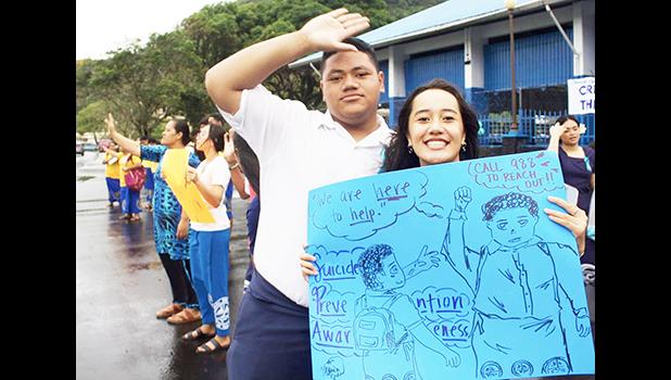 students with sign
