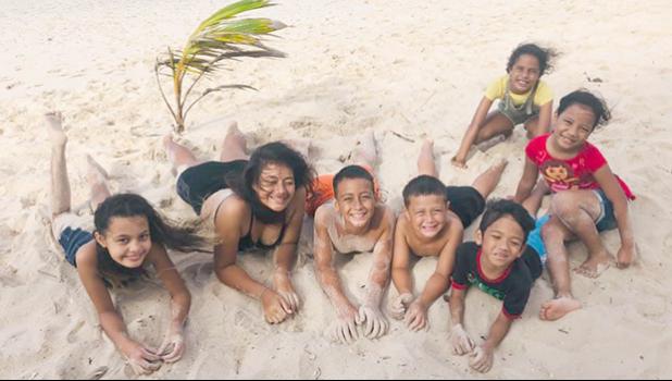 children playing on the beach