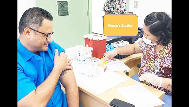 Task Force chairman, Lt Governor Talauega, getting vaccinated
