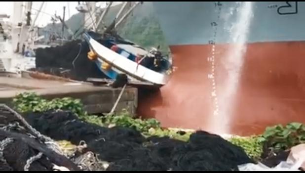 A screen shot of a video taken by Frank Barron of the incident that happened last Thursday afternoon, where the oil tanker, CSC Brave, crashed into the stern (back) of a purse seiner vessel docked at the main-dock area where fishing nets are repaired, near the Fuel Dock. Samoa News was told at the time that the incident looked like it had been caused by government tugboats, however, Port Administration says no, it was caused by the tanker’s engine problems. US Coast Guard’s investigation of the incident is 