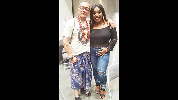 Organizer for the Northwest Tatau Festival, Whitey Chen, with Samoan comedian Nicey Malauulu, better known as 'Teine Meauli', during the three-day event held in Tacoma, WA which was the first of many activities held during the week-long Samoan Flag Day celebrations.  [photo: Blue Chen-Fruean]