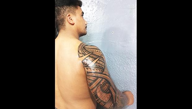 One of the 20 people, so far, who has agreed to get inked and take part in an ongoing study that could possibly prove a link between tattoos and a robust immune system. Pictured is an arm sleeve by Off Da Rock owner Joseph Ioane. See story for full details.  [photo: courtesy]