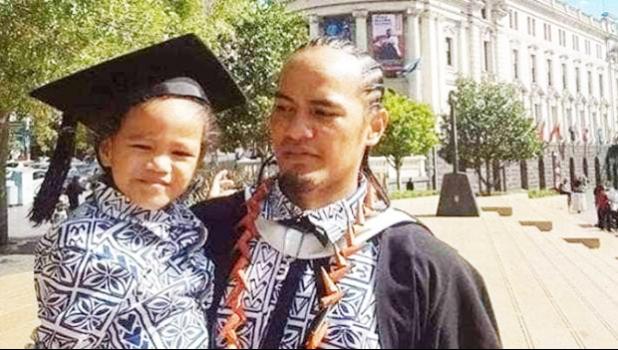 Jeremiah Malaki Tauili'ili with his son.