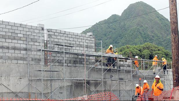 Nana's Construction crew building block wall at TCF