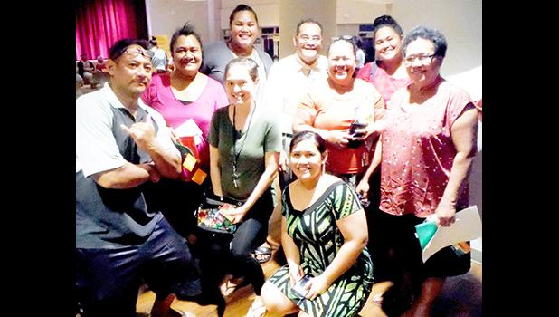 Some of American Samoa’s in-service teachers gather around Dr. Larry Purcell (back row, in white shirt)