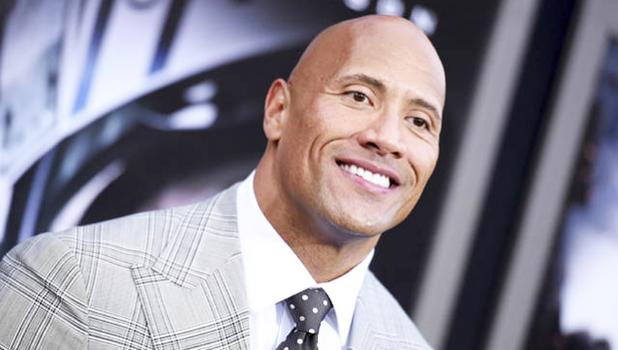 Dwayne Johnson arrived at the May 2015 premiere of “San Andreas” at the TCL Chinese Theatre in Los Angeles. Johnson told GQ for a story published today that he is seriously considering a run for president. [AP file photo]