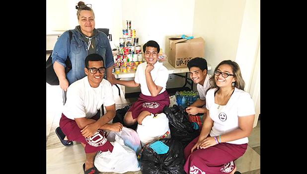 Members of Tafuna High School Class of 2022 with donations