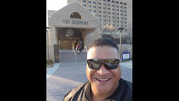 Lt. Tolia Tanu Solaita Jr. in front of FBI Academy