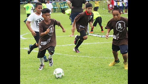 A Vaiala Tongan player of the Boys 10-12 division in action against Ilaoa & To’omata