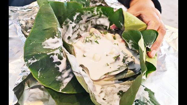 Tongan Lu involves taro leave, onions, meat and coconut cream 