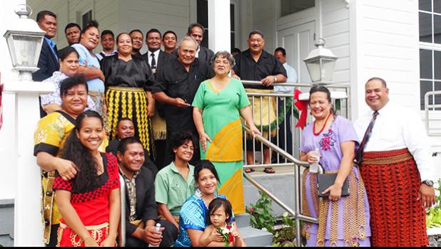 Gov. Lolo M.  Moliga and First Lady Cynthia Moliga with members of the Tongan community who brought food for the first family to the Governor’s Mansion on Sunday, Jan. 5, 2014. Mafi Sione Lousiale Lotolua Kava said, , “We, the adopted sons and daughters of American Samoa of Tongan decent felt it an honor and an obligation to provide this “pola” of food to the father and mother of the Territory of American Samoa.”   [SN file photo]