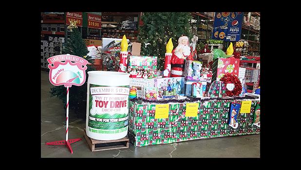 “Pay it Forward, Toy Drive”, drop off bin at the Cost-U-Less store. The toy drive project is to help children of Samoa Tuna Processors employees, who will be laid off at the end of this week.  [courtesy photo]