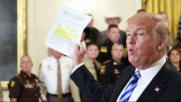 President Donald Trump responds to a reporters question during an event with sheriffs in the East Room of the White House in Washington, Wednesday, Sept. 5, 2018. (AP Photo/Susan Walsh) Donald Trump responds to a reporters