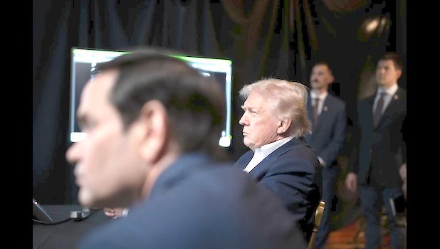 In this photo released by the White House, President Donald Trump monitors U.S. military operations in Venezuela, with Secretary of State Marco Rubio at Mar-a-Lago in Palm Beach, Fla., Saturday, Jan. 3, 2026. (Molly Riley/The White House via AP) Trump & Rubio