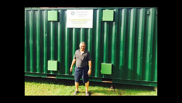 In this Samoa News file photo, Su’a Alexander Eli Jennings outside of the retrofitted freight container back in October 2015, where raw ulu will be processed and dried to be milled into gluten free, low glycemic index flour. The container operates on solar panels to provide renewable energy for the retrofitted container.   [Photo: JL]