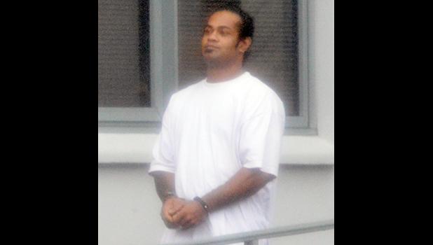 Eddieboy Vaavale in handcuffs