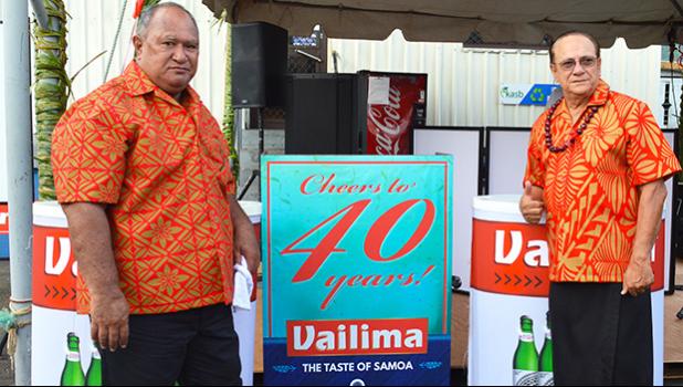 Latu Kupu and Afa Young showing off “Vailima, Samoa’s Own Beer” special signage